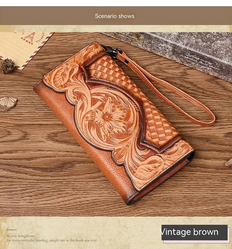 Women's brown tri-fold leather wallet with an embossed floral pattern, shown open to reveal compartments.