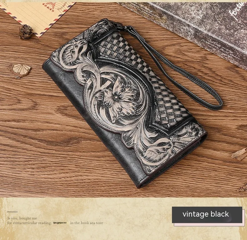 Women's brown tri-fold leather wallet with an embossed floral pattern, shown open to reveal compartments.