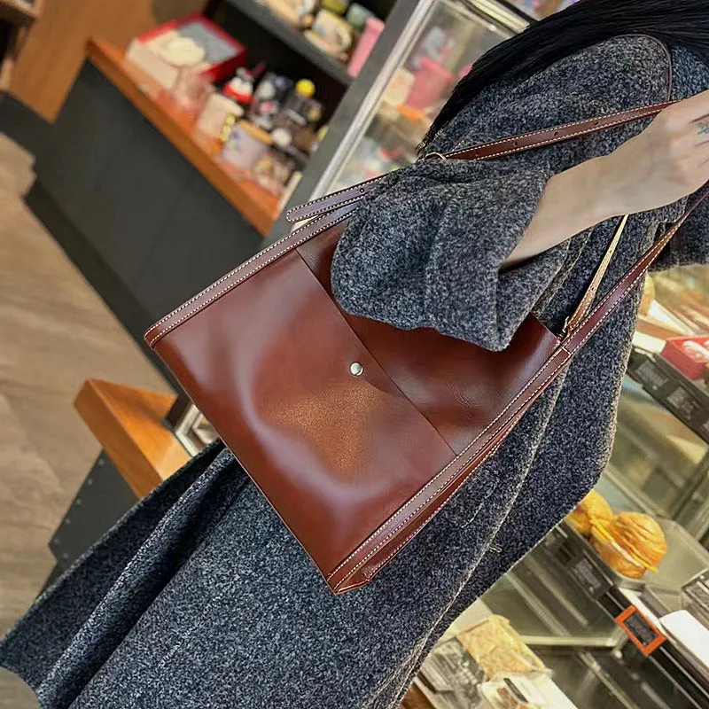 Genuine leather women's tote bag with organised interior compartments in sunset yellow colour