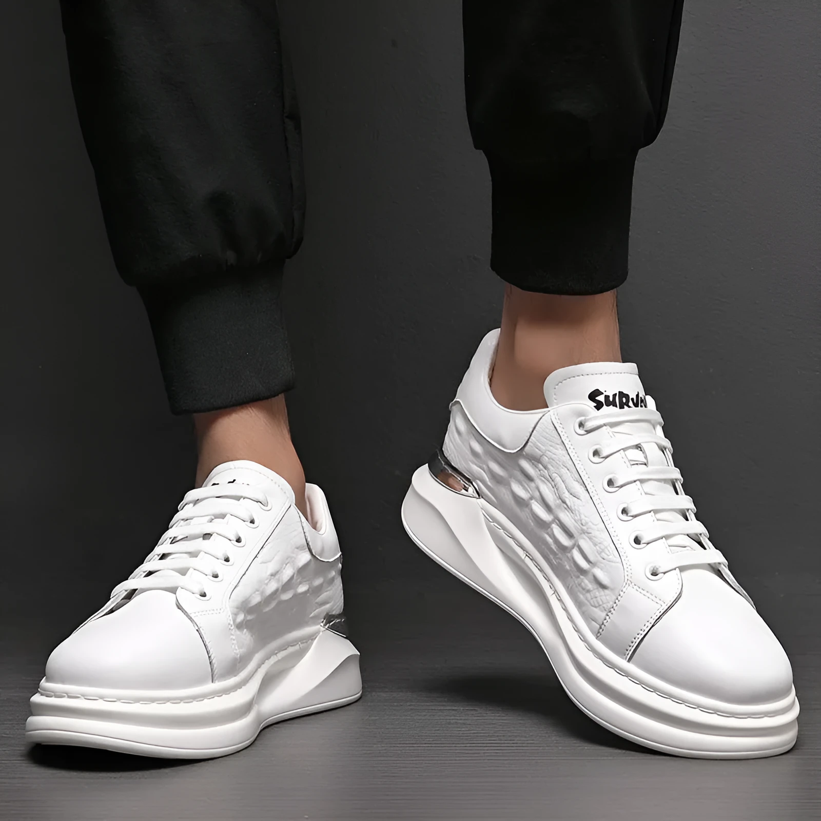 Men's platform casual shoes in brown cowhide leather with white laces and black PU sole on a white background