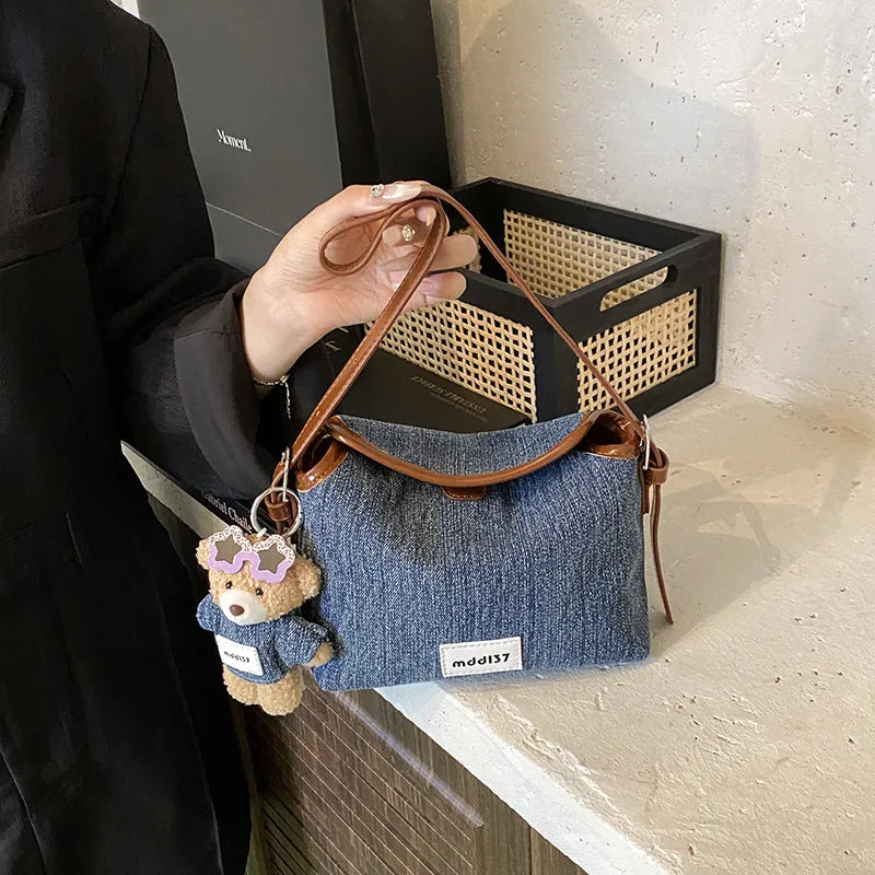 Fashion retro denim small crossbody bag in black with slit pocket and pendant