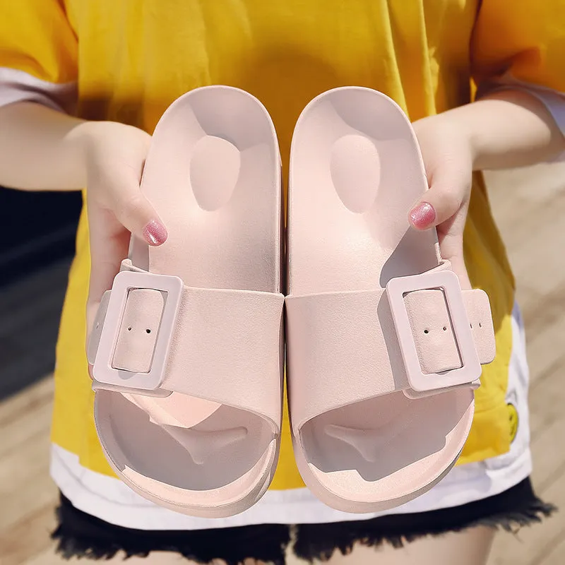 Grey blue women's flip-flop slippers with a single buckle on a soft EVA sole.