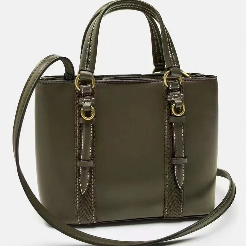 Women's olive green mini city messenger bag in PU leather with single shoulder strap and horizontal square shape