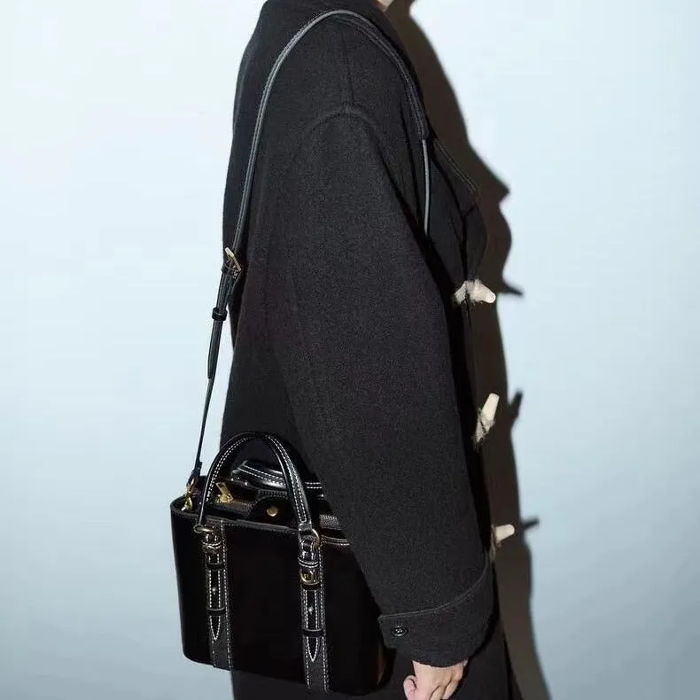 Women's olive green mini city messenger bag in PU leather with single shoulder strap and horizontal square shape