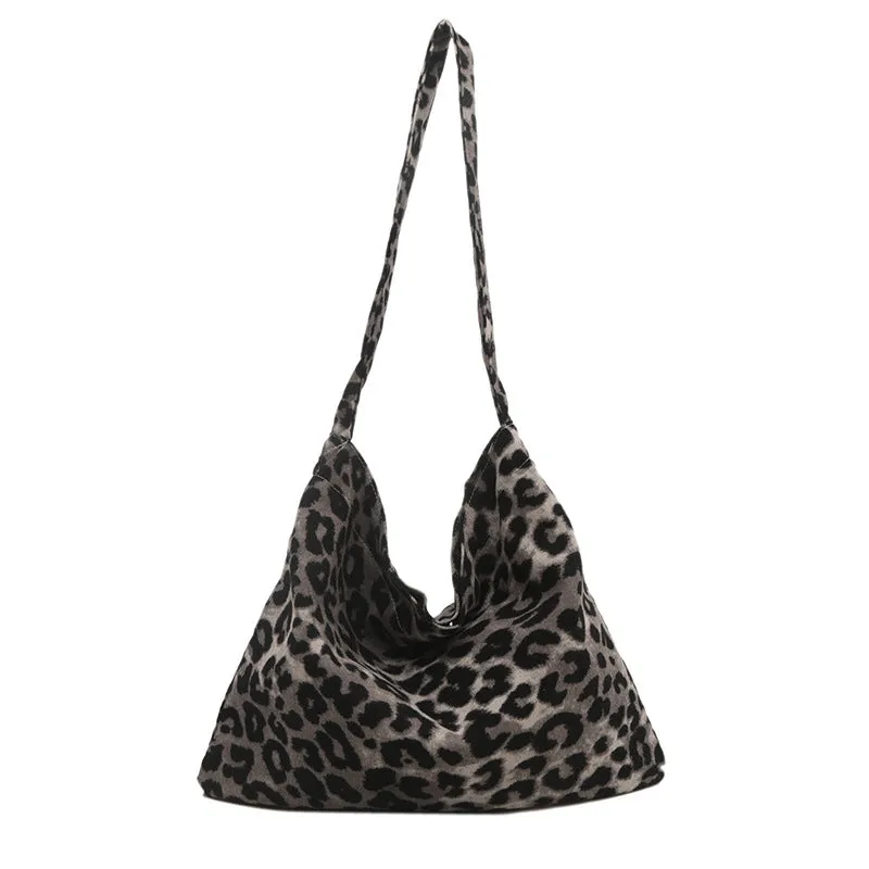 Leopard print shoulder messenger bag with square vertical shape and single strap, available in black, brown, and pink