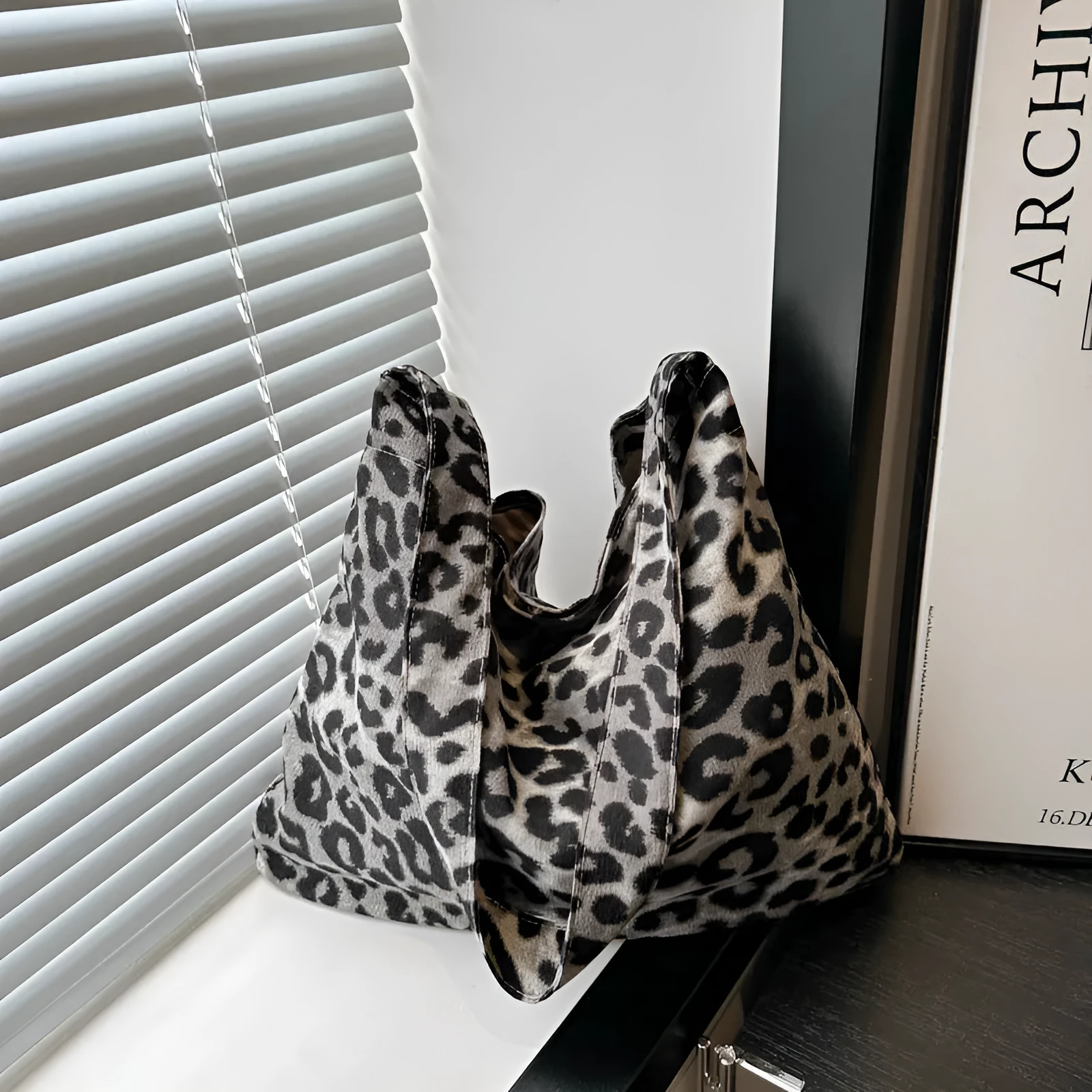 Leopard print shoulder messenger bag with square vertical shape and single strap, available in black, brown, and pink