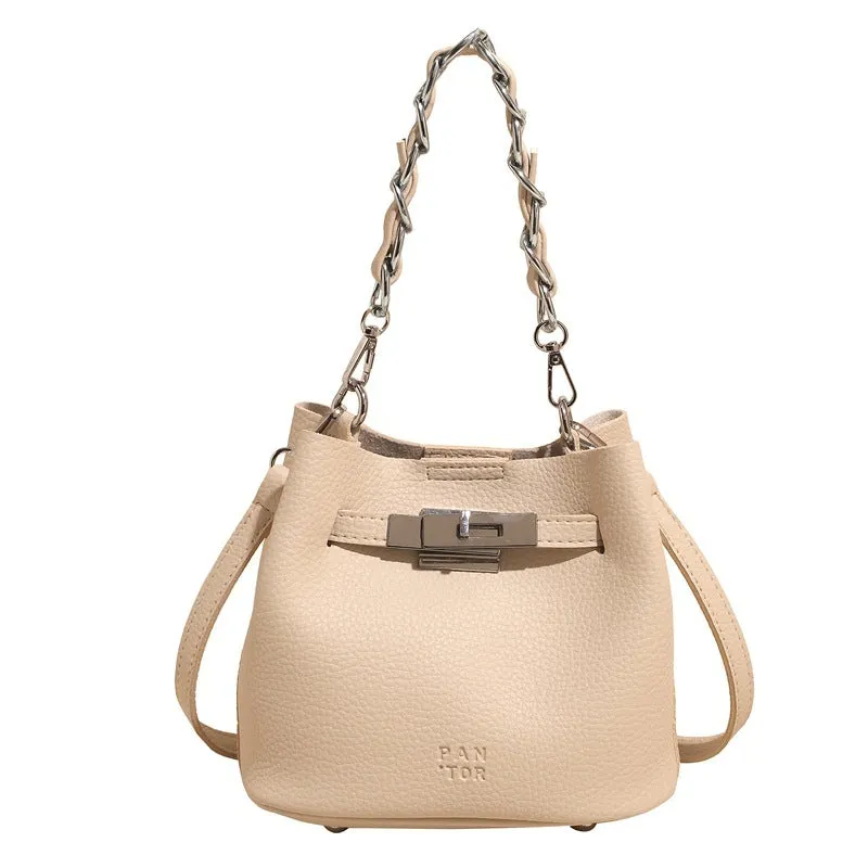Retro black PU leather bucket shoulder bag with chain detail and adjustable strap