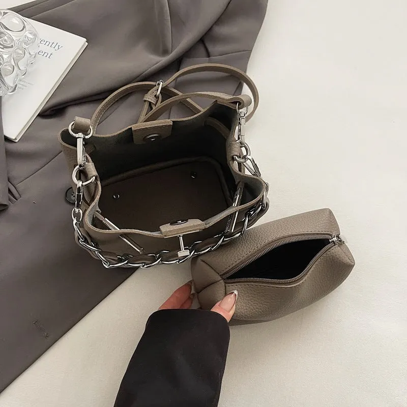 Retro black PU leather bucket shoulder bag with chain detail and adjustable strap