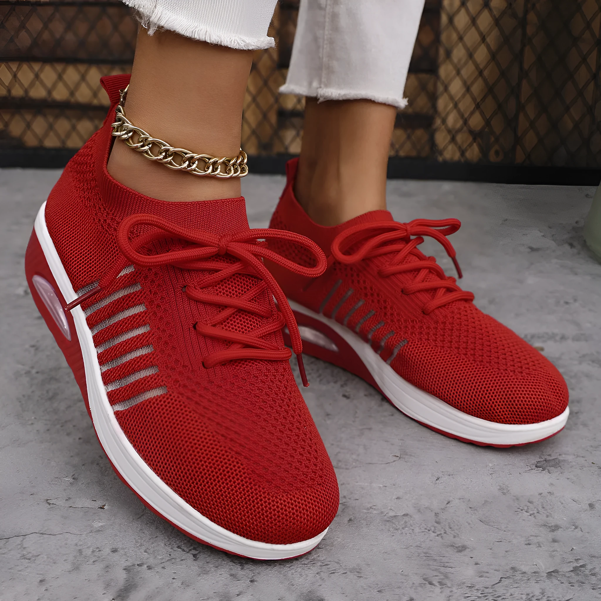 Women's lace-up slip-on wedge sports shoes in black with mesh upper and mid heel height increase