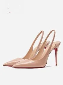 Women's black stiletto heel sandals with ankle strap and pointed toe on a red background