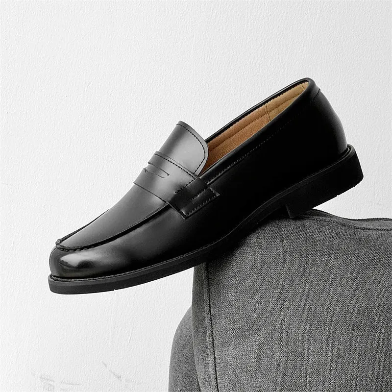 Black men's classic slip-on derby leather shoes with a rubber sole on a white background