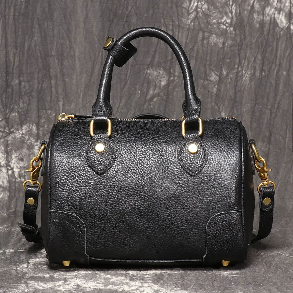 Brown yellow first layer cowhide Boston bag with cylindrical shape and single shoulder strap