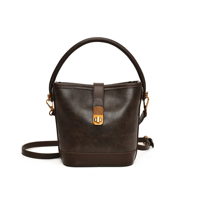 Women's PU handbag in simple style available in black, brown, and coffee colours in large and small sizes