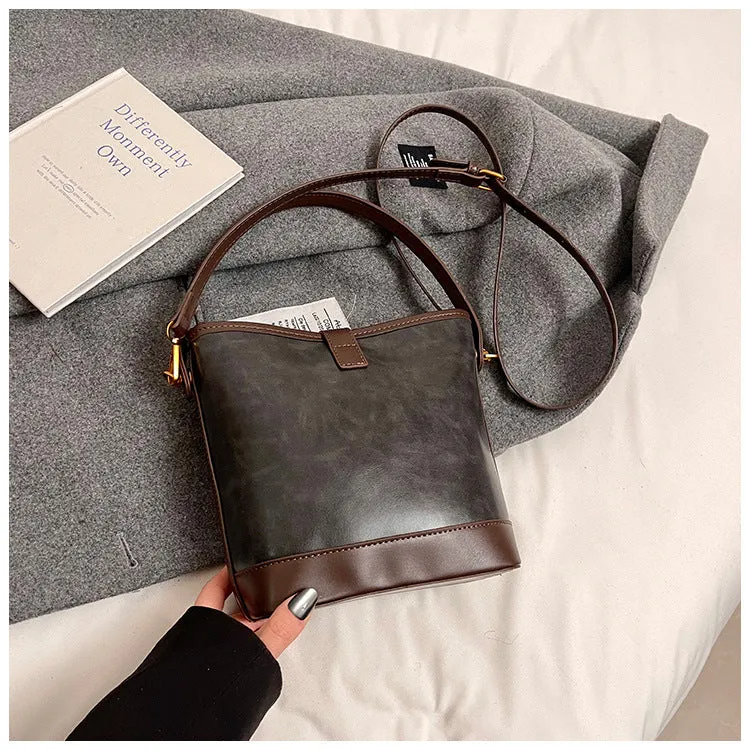 Women's PU handbag in simple style available in black, brown, and coffee colours in large and small sizes