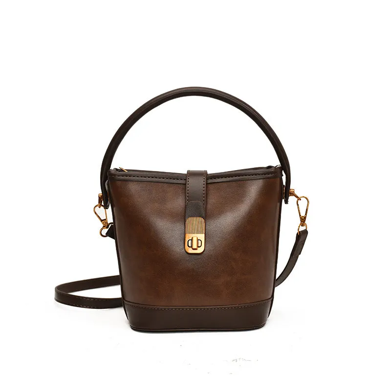 Women's PU handbag in simple style available in black, brown, and coffee colours in large and small sizes