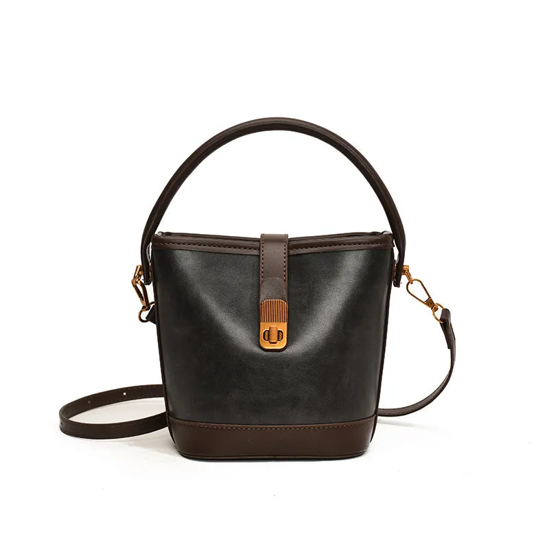Women's PU handbag in simple style available in black, brown, and coffee colours in large and small sizes