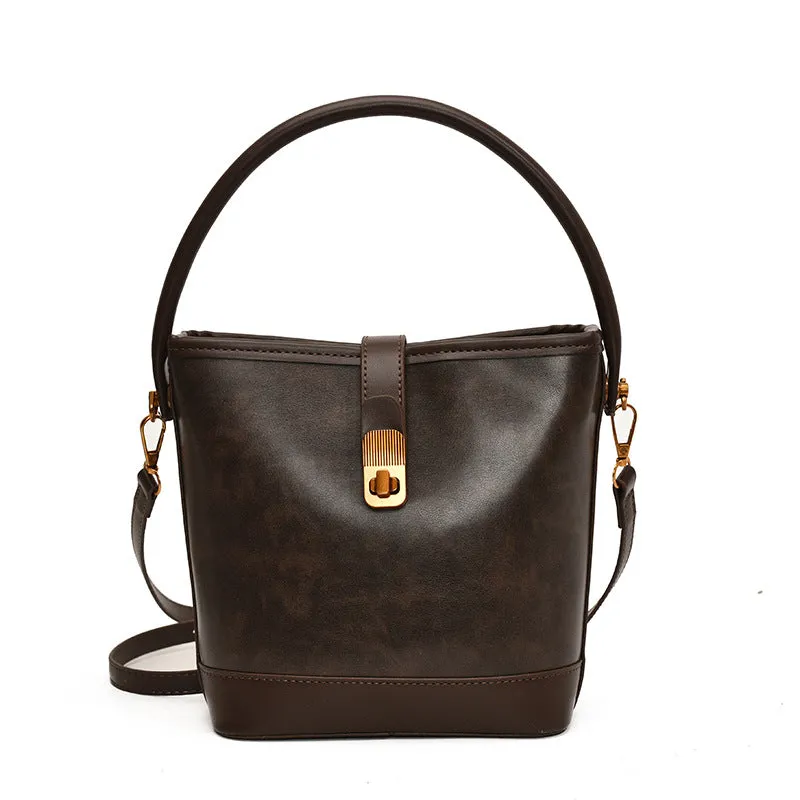 Women's PU handbag in simple style available in black, brown, and coffee colours in large and small sizes