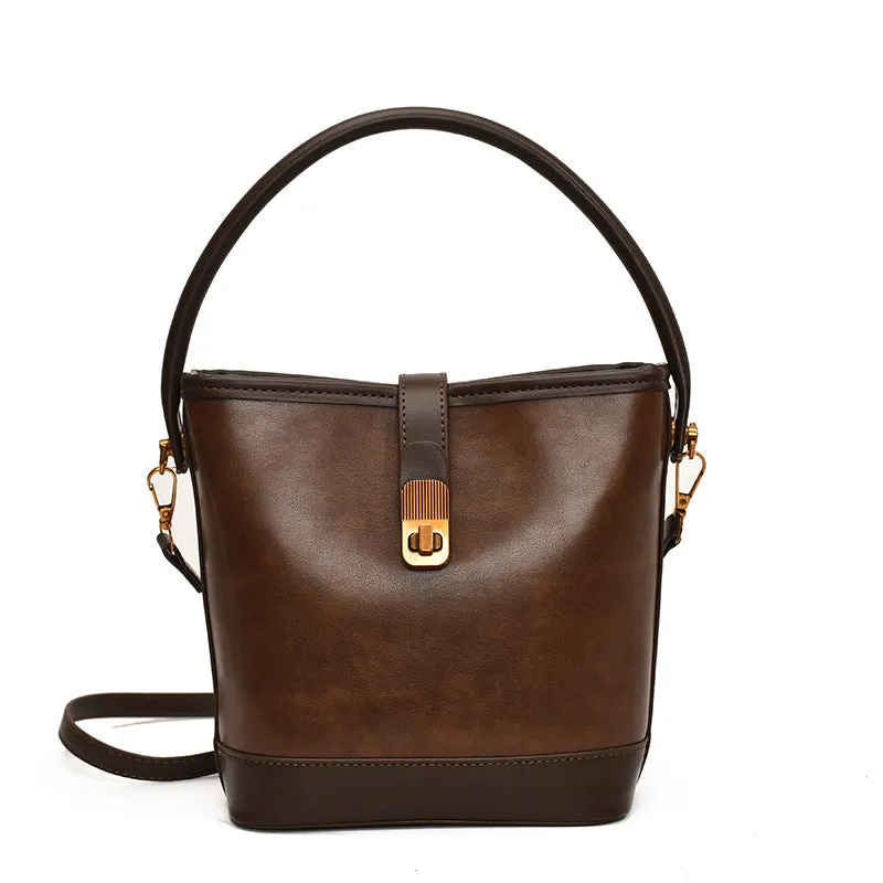 Women's PU handbag in simple style available in black, brown, and coffee colours in large and small sizes