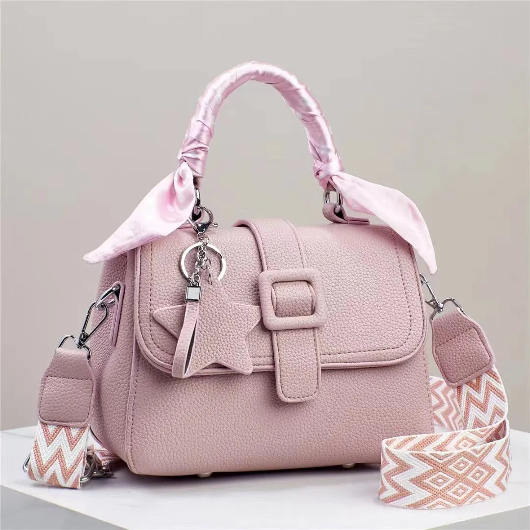 Solid colour handbag in beige with crocodile pattern texture, featuring a zippered top and interior organisation pockets