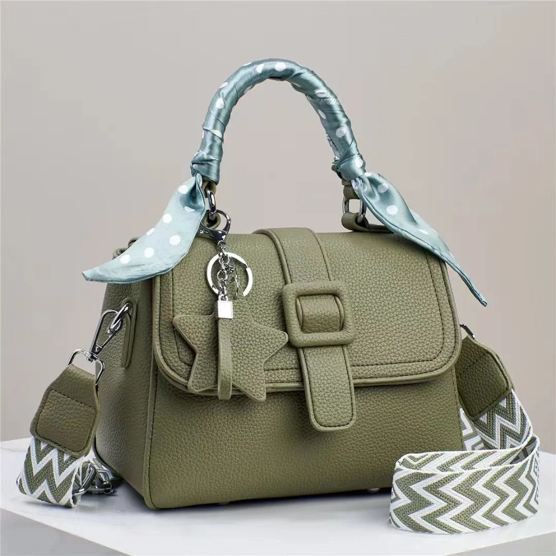 Solid colour handbag in beige with crocodile pattern texture, featuring a zippered top and interior organisation pockets