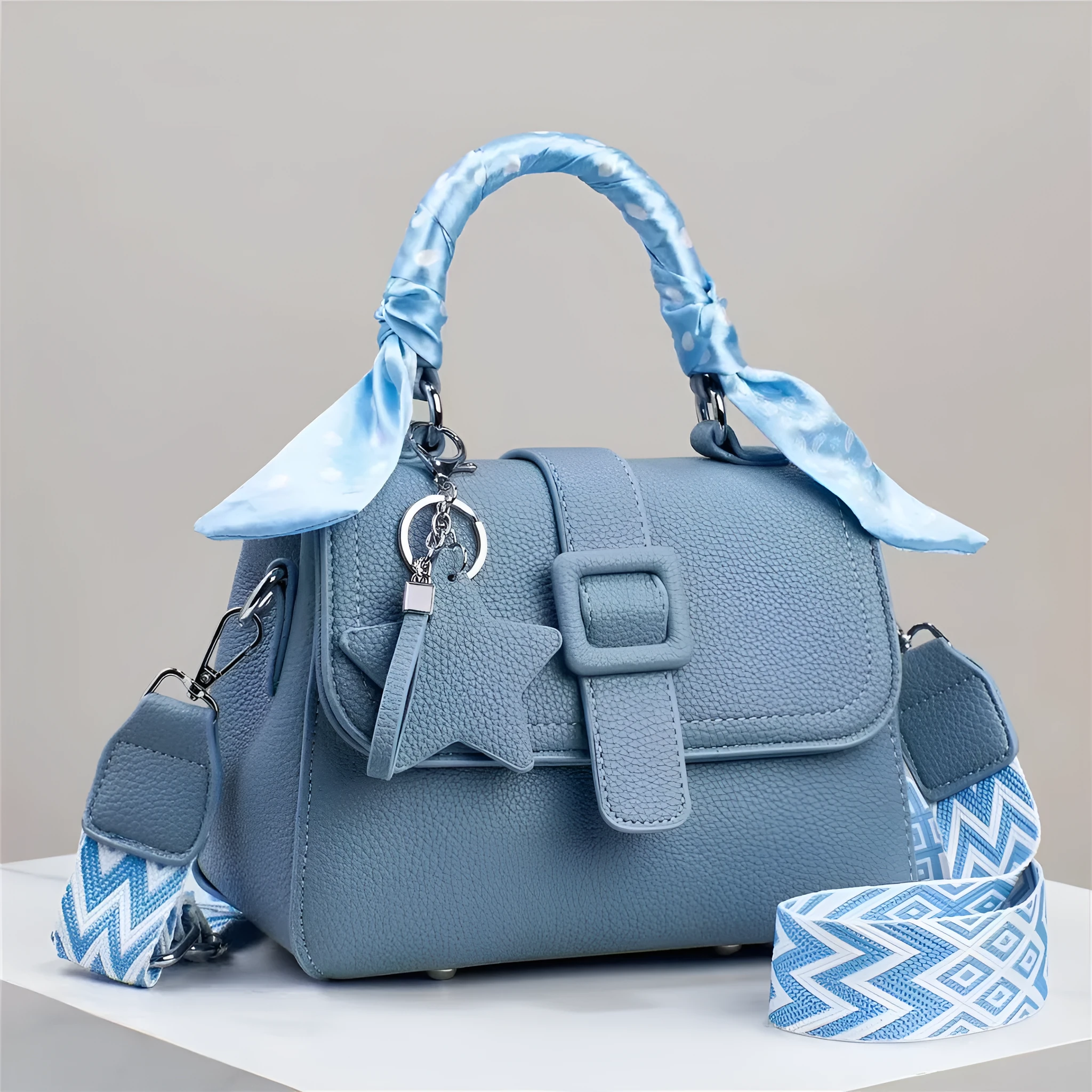 Solid colour handbag in beige with crocodile pattern texture, featuring a zippered top and interior organisation pockets