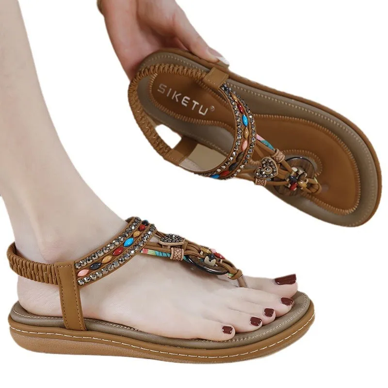 Women's rhinestone flip-flop sandals with leather lining and TPR sole in apricot, black, and khaki