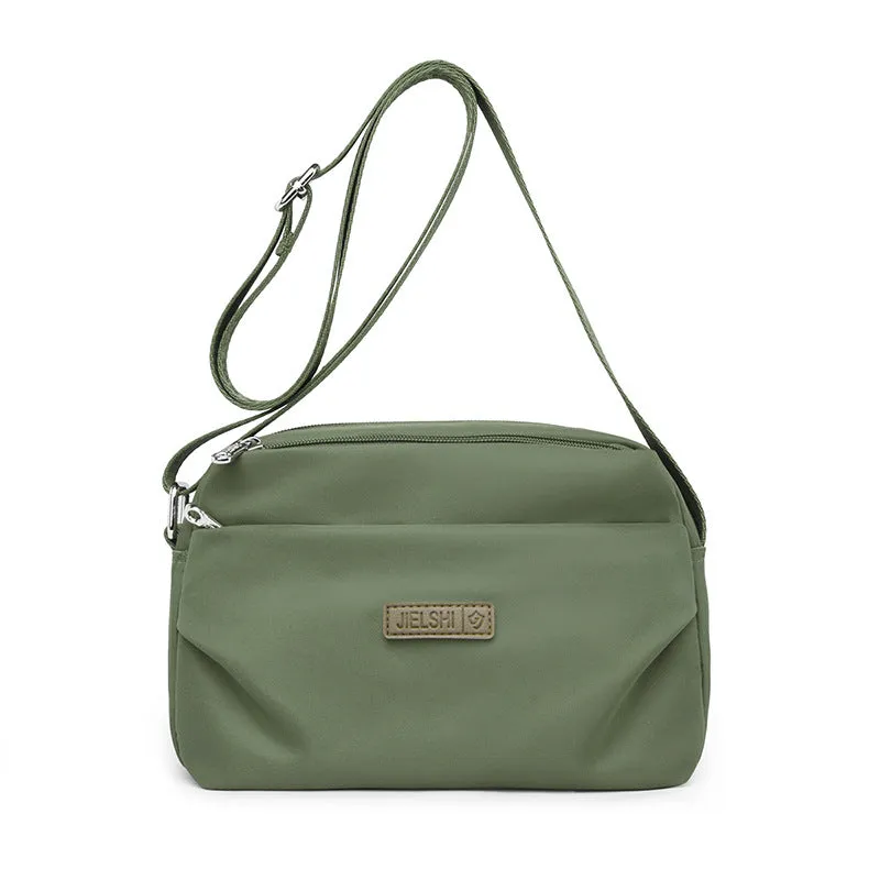 Women's soft nylon multi compartment shoulder bag in urban simplicity style, horizontal square shape, available in multiple colours