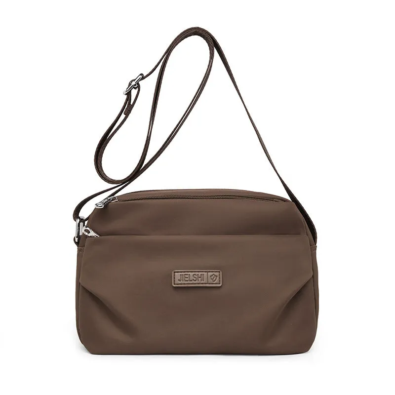 Women's soft nylon multi compartment shoulder bag in urban simplicity style, horizontal square shape, available in multiple colours