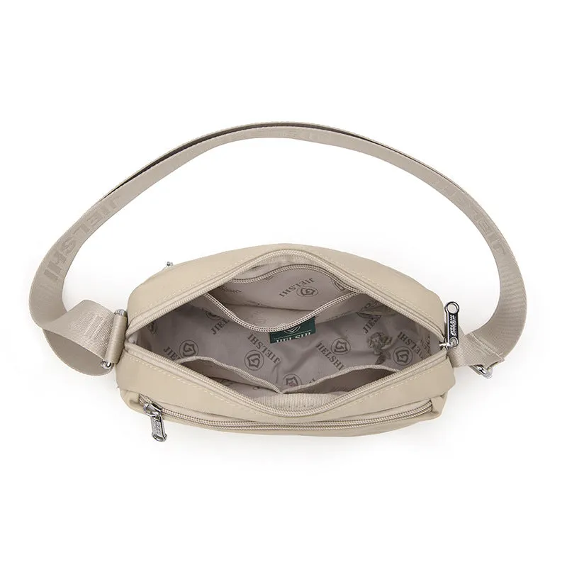 Women's soft nylon multi compartment shoulder bag in urban simplicity style, horizontal square shape, available in multiple colours