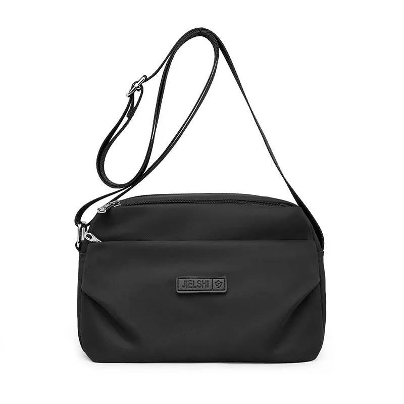Women's soft nylon multi compartment shoulder bag in urban simplicity style, horizontal square shape, available in multiple colours