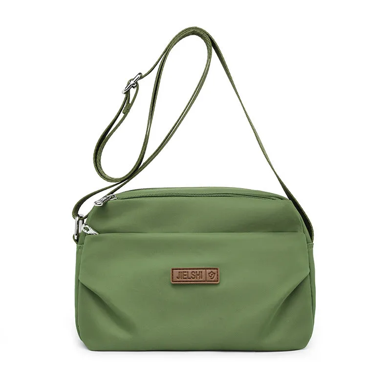 Women's soft nylon multi compartment shoulder bag in urban simplicity style, horizontal square shape, available in multiple colours