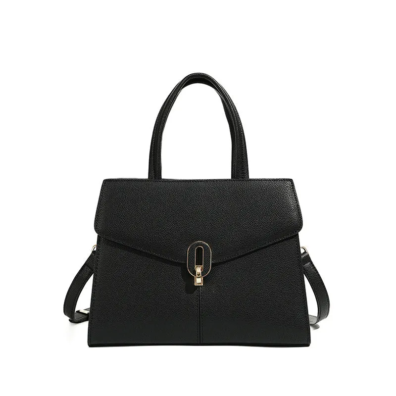 Genuine leather box handbag with litchi pattern and lock detail in brown