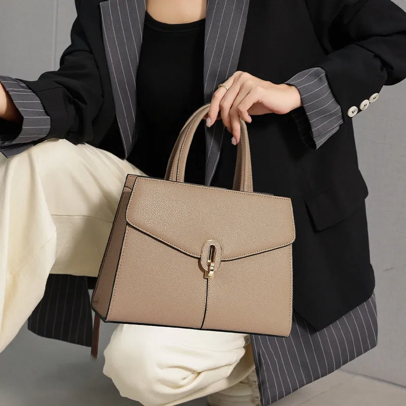 Genuine leather box handbag with litchi pattern and lock detail in brown