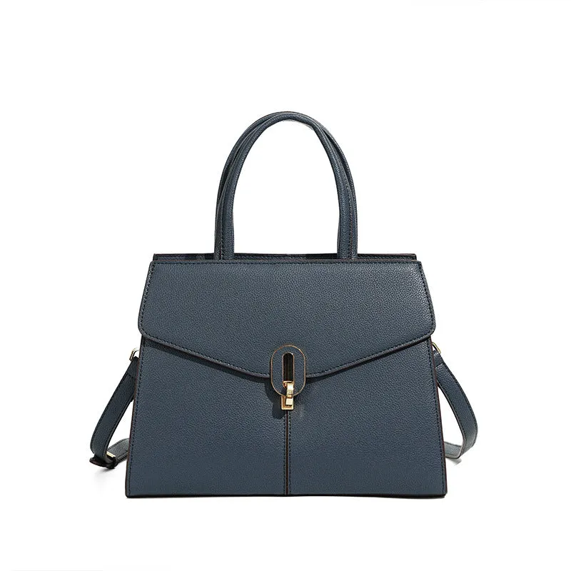 Genuine leather box handbag with litchi pattern and lock detail in brown