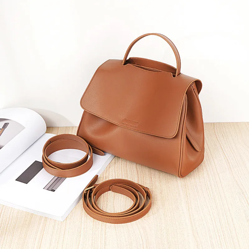 Genuine two-layer cowhide leather crossbody shoulder bag for women, horizontal square shape, solid colour with visible sewing thread detail