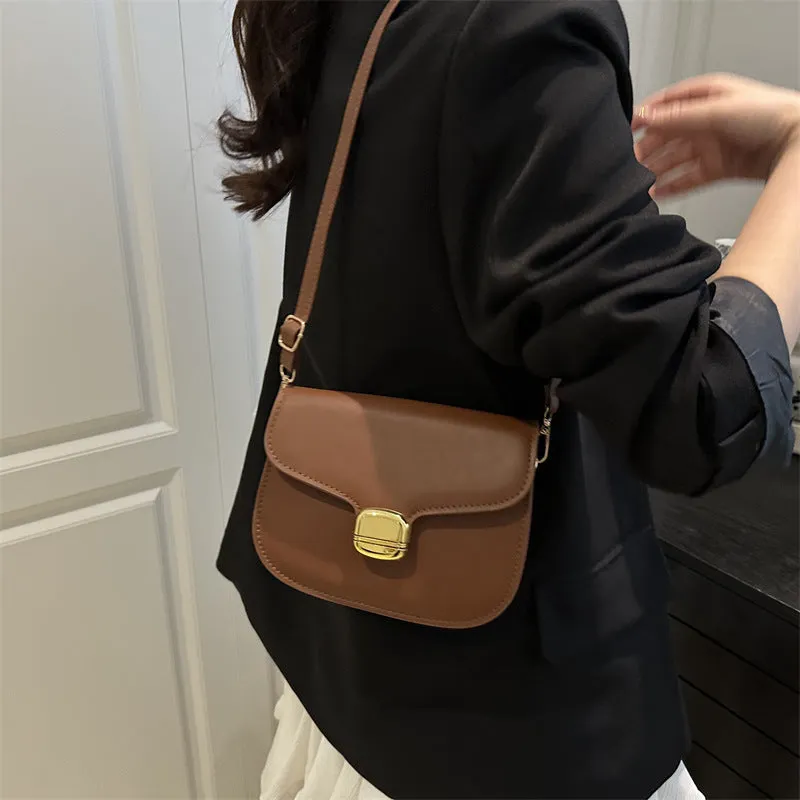 Simple PU handbag in khaki colour showing internal phone compartment and change pocket