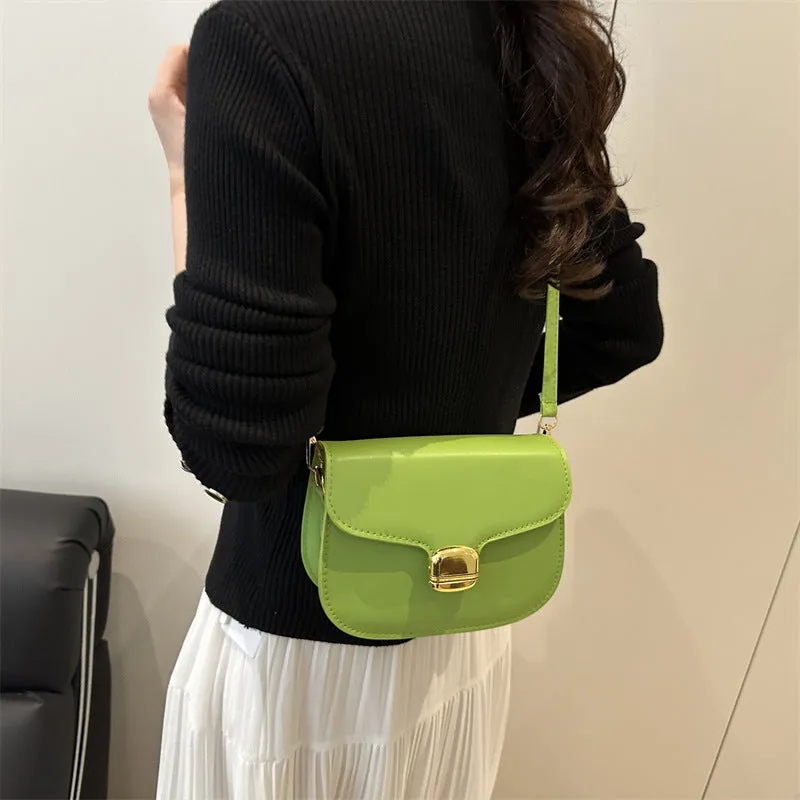 Simple PU handbag in khaki colour showing internal phone compartment and change pocket