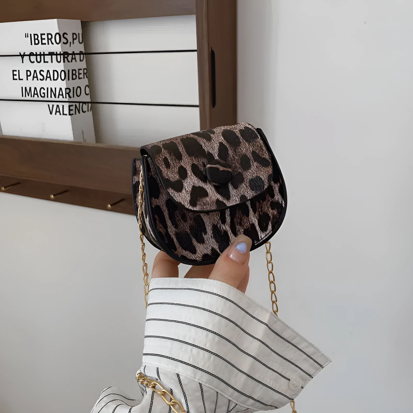 Leopard print mini crossbody saddle bag in PU, horizontal square shape with sandwich pocket, black and reddish brown