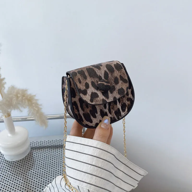 Leopard print mini crossbody saddle bag in PU, horizontal square shape with sandwich pocket, black and reddish brown