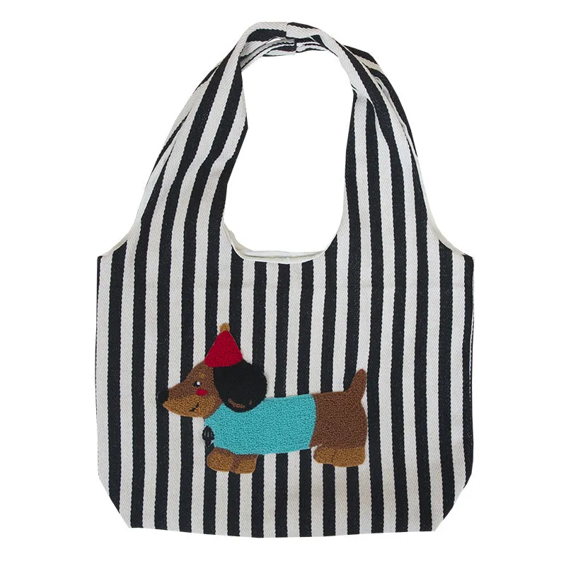 Soft canvas shoulder bag with red stripes and cartoon embroidery of a puppy wearing a red hat, square vertical shape, double shoulder straps