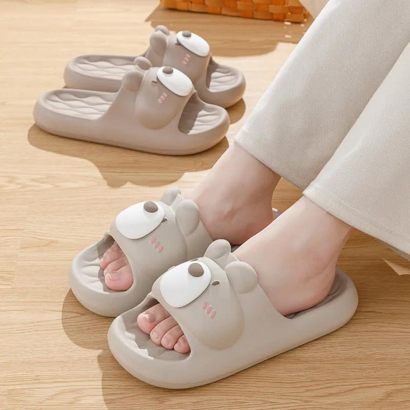 Pair of brown cartoon bear EVA flip flops for adults, toe baring sandal style