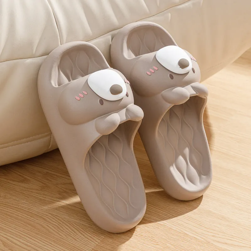 Pair of brown cartoon bear EVA flip flops for adults, toe baring sandal style