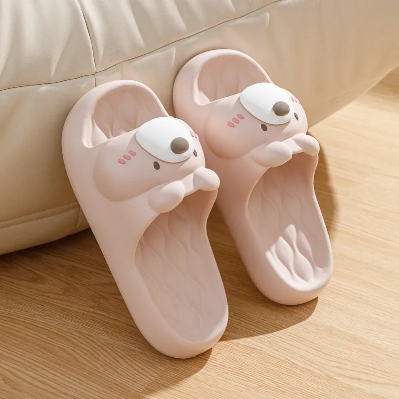 Pair of brown cartoon bear EVA flip flops for adults, toe baring sandal style