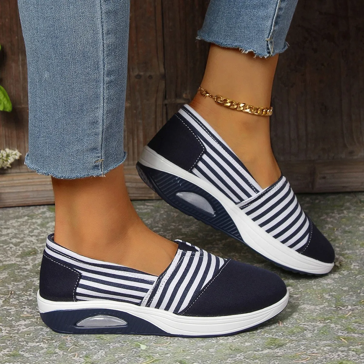 Women's striped canvas casual shoes in blue with flat platform heel and round head