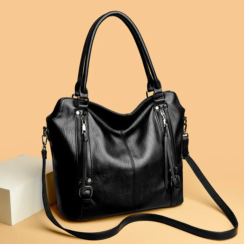 Women's large capacity PU shoulder messenger bag in black with square vertical shape and single strap