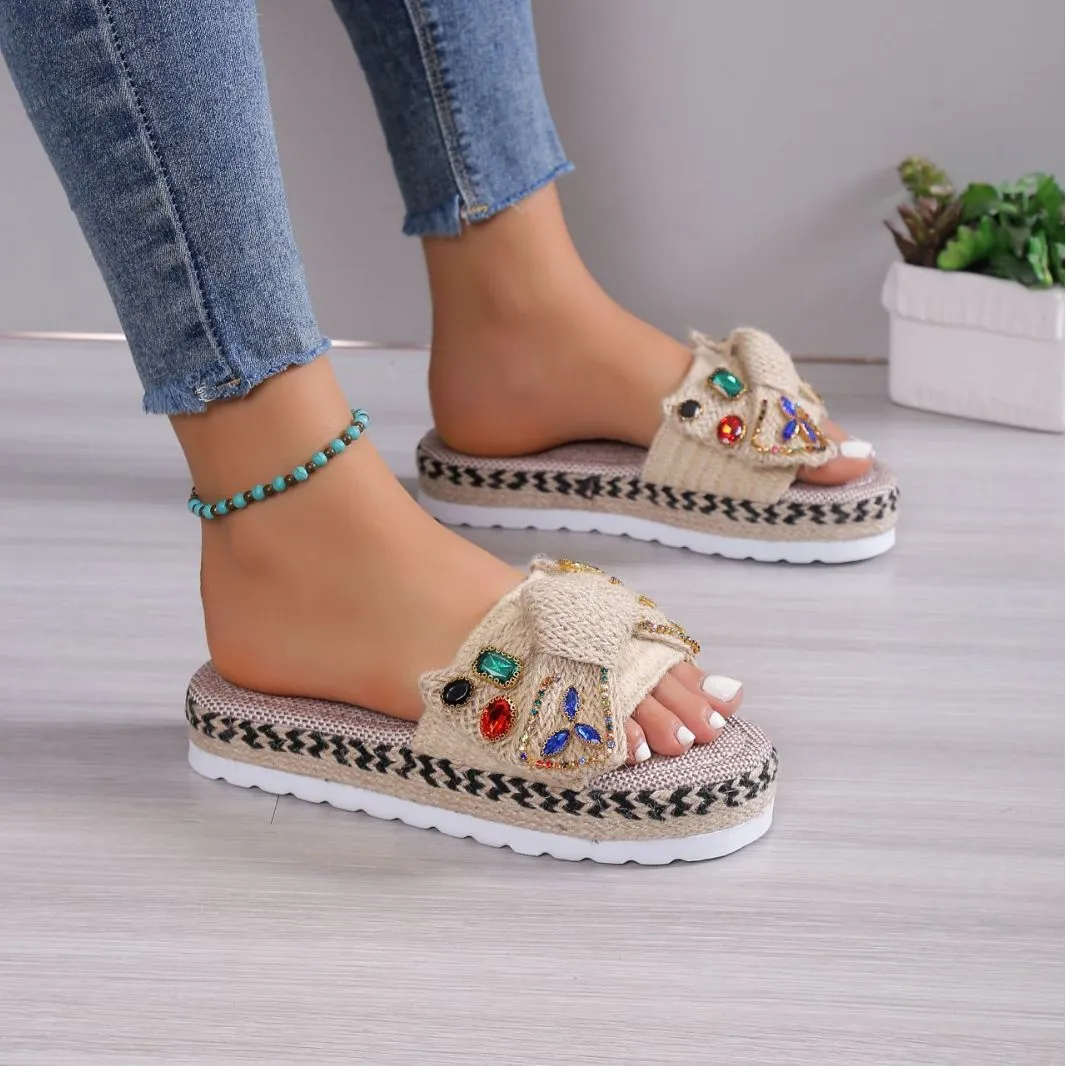 Creamy-white women's platform sandals with a cloth upper, round toe, and a decorative beach bow.