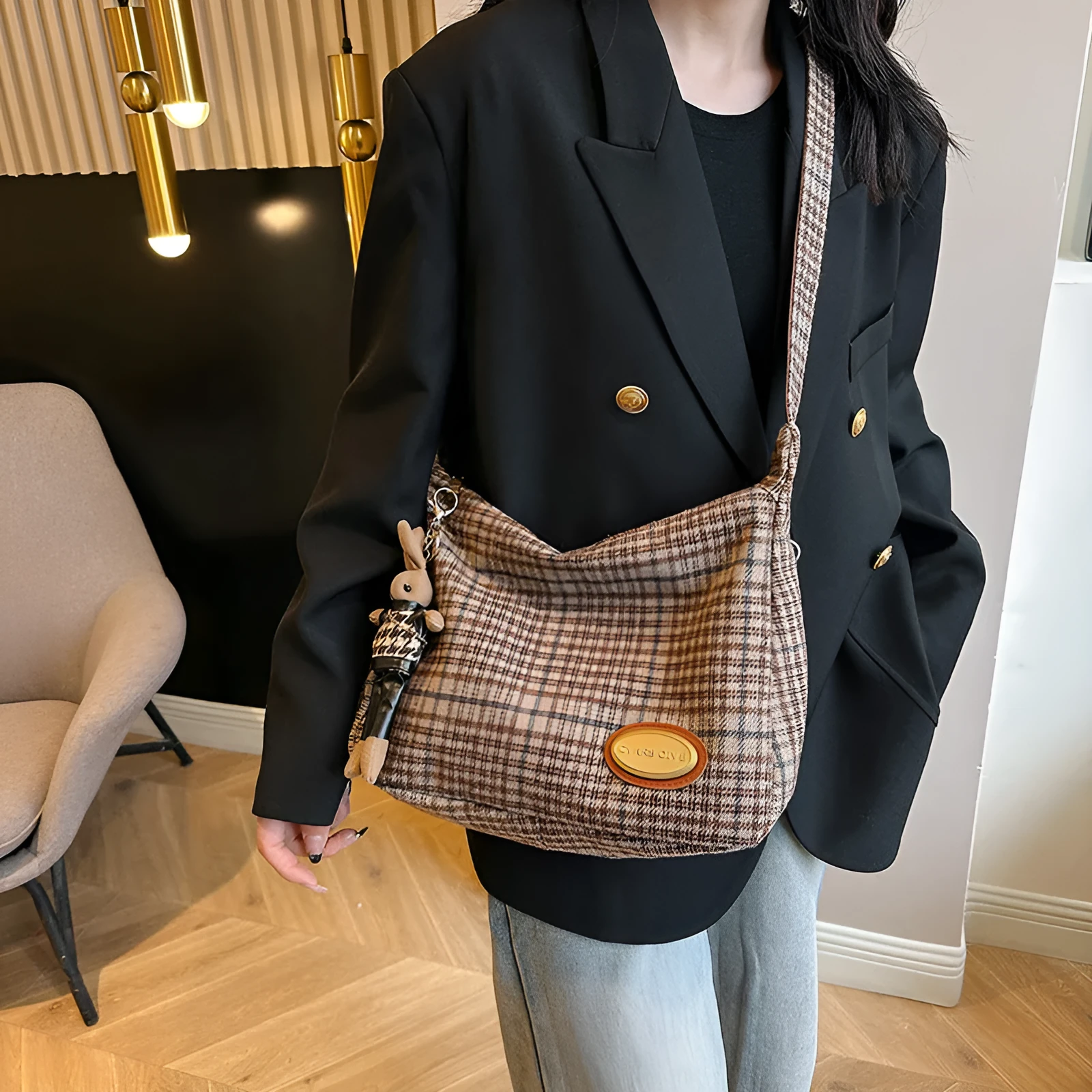Women's large soft woolen cross-body shoulder bag in a horizontal square shape, shown in a choice of colours.