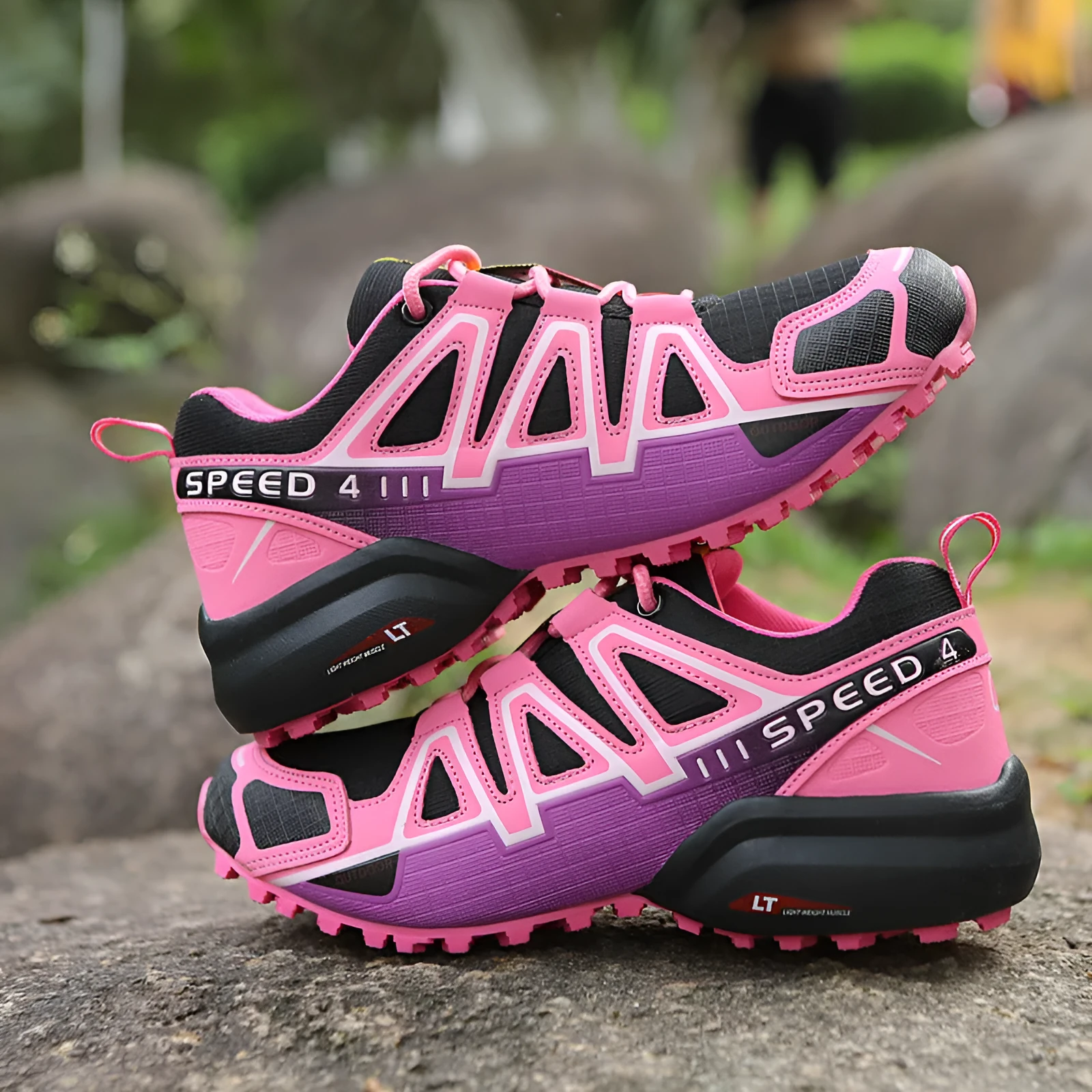 Off-road outdoor climbing boots with non-slip rubber sole and mesh fabric upper, available in purple and gray