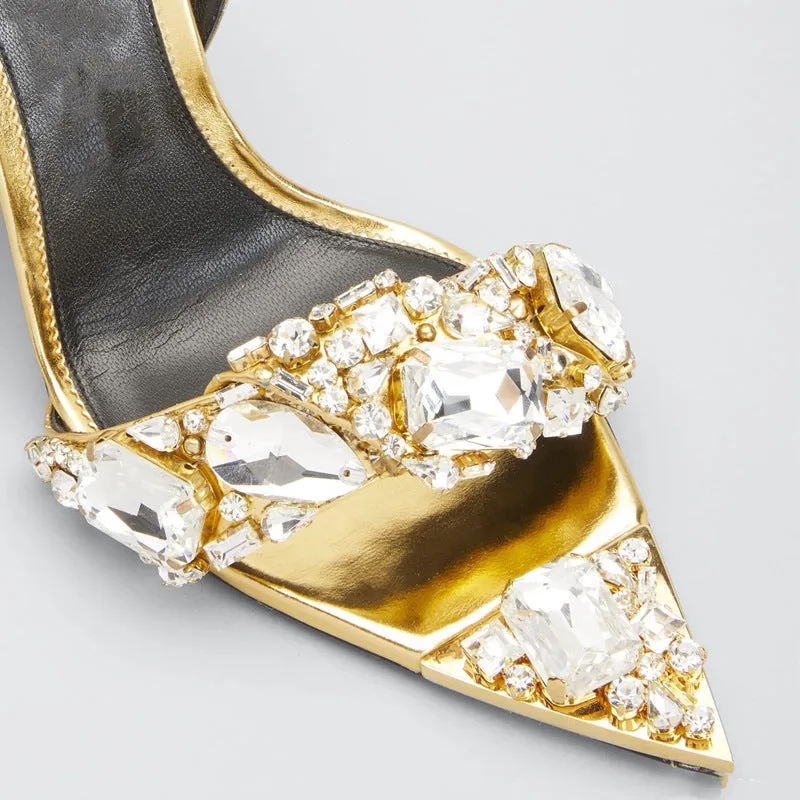 Super high heel pointed toe rhinestone slingback heels in gold on display