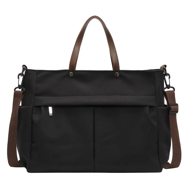Women's nylon crossbody tote shoulder bag in black colour with measurements 39x14x28cm